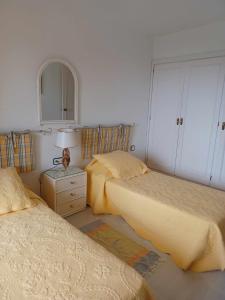 Postel nebo postele na pokoji v ubytování Las Velas 3 18 Fantástico apartamento con vistas