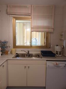 Kuchyň nebo kuchyňský kout v ubytování Las Velas 3 18 Fantástico apartamento con vistas