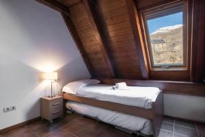 Posteľ alebo postele v izbe v ubytovaní Apartamentos SNÖ Mont Romies Unhola