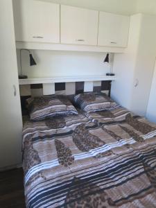 Кровать или кровати в номере dutchduochalet2