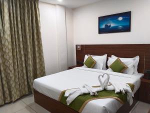 Hotel Seapark客房内的一张或多张床位