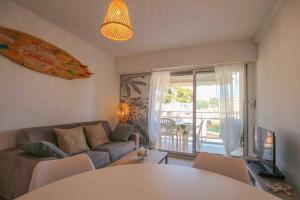 TV a/nebo společenská místnost v ubytování Super emplacement, appartement 2 chambres