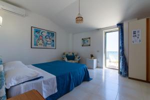 Posteľ alebo postele v izbe v ubytovaní Villa Diamante Costa dei trabocchi Vasto