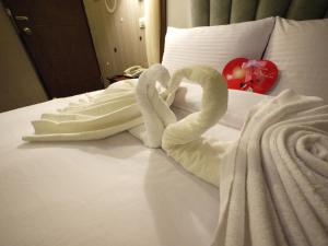 Letto o letti in una camera di Fu Chia Hotel