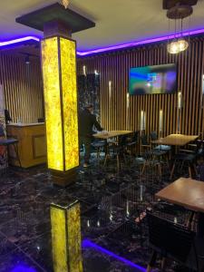 A restaurant or other place to eat at Gold Corner Hotel