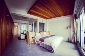 Voodi või voodid majutusasutuse Sasa Nor Lamour B&B toas