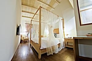 Voodi või voodid majutusasutuse Sasa Nor Lamour B&B toas