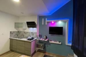 Kuchyň nebo kuchyňský kout v ubytování Le prestige centre-ville de Douai