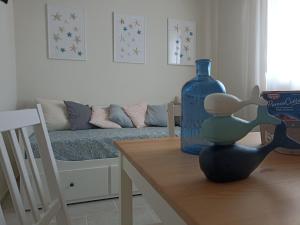 Гостиная зона в BlueSun Apartments