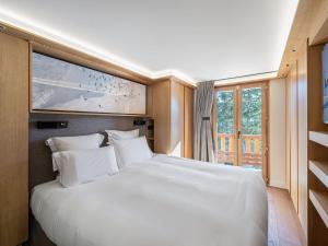 Fotografia z galérie ubytovania Triplex de charme avec cheminée, balcon et parking à Courchevel Chenus, proche des pistes - FR-1-564-90 v destinácii Courchevel