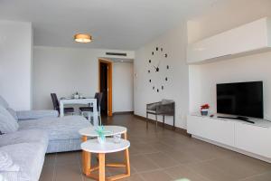 Homeincalpe Borumbot的电视和/或娱乐中心