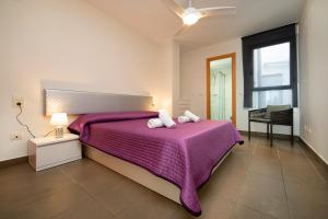 Cama ou camas em um quarto em Homeincalpe Borumbot