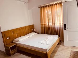 Postel nebo postele na pokoji v ubytování ELMA Guest House