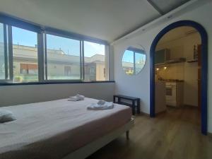 A bed or beds in a room at Gelsomino B&B Apartment