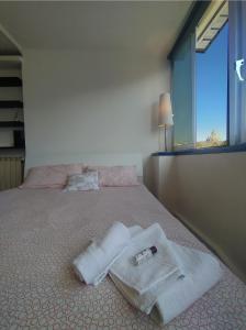 A bed or beds in a room at Gelsomino B&B Apartment