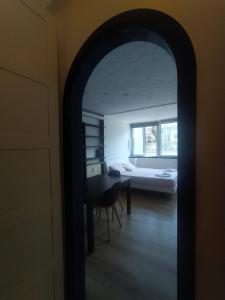 A bed or beds in a room at Gelsomino B&B Apartment