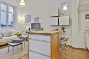 Kuchyňa alebo kuchynka v ubytovaní Appartement Ampalia - Welkeys