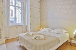 Posteľ alebo postele v izbe v ubytovaní Appartement Ampalia - Welkeys