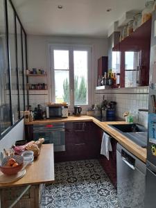 Kuchyň nebo kuchyňský kout v ubytování Chambre - Marceau