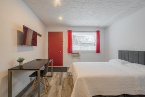 Postel nebo postele na pokoji v ubytování Motel Champlain