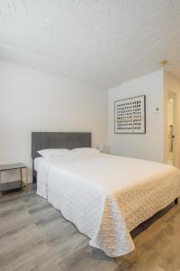 Postel nebo postele na pokoji v ubytování Motel Champlain