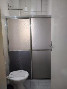 a shower stall with a toilet in a bathroom at Hotel Mirante da Serra in Ouro Branco +16 photos