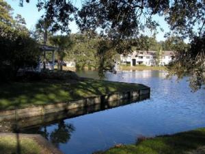 a body of water with a bridge in the middle at Q4 Professionally decorated upstairs beautiful soothing colors close to back pool in Saint Simons Island