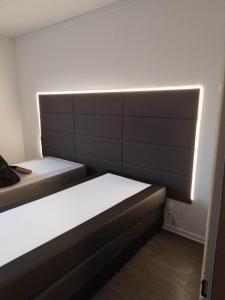 Posteľ alebo postele v izbe v ubytovaní Appartement Gauche avec balcon