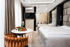 Łóżko lub łóżka w pokoju w obiekcie Salomea apartments Kraków, Stary Kazimierz, Tauron arena