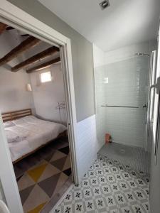 A bed or beds in a room at Punta Me Beautiful Apartment in Plaza España