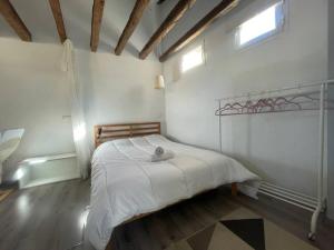 A bed or beds in a room at Punta Me Beautiful Apartment in Plaza España