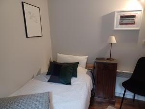 Rúm í herbergi á Maison d'Engon charme nature