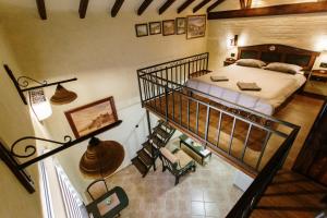 Voodi või voodid majutusasutuse Apartmani Sirmium toas