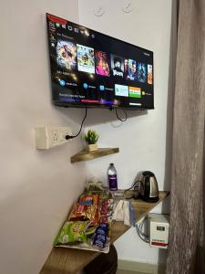 TV a/nebo společenská místnost v ubytování Hotel Buddha International