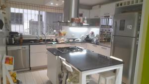 Kuchyň nebo kuchyňský kout v ubytování TORRE BARRANCAS DE BELGRANO + 17 fotografií