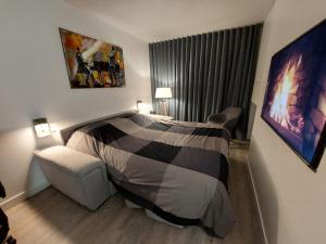 Posteľ alebo postele v izbe v ubytovaní Superbe appartement cosy - Plage des minimes