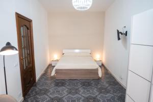 A bed or beds in a room at Al Corso 213