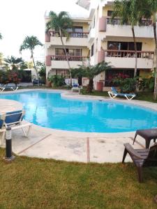 The swimming pool at or close to Lavish Condo @Carlos Residential