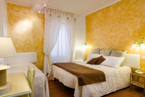 a hotel room with a bed and a window at Hotel Marina in Monterosso al Mare