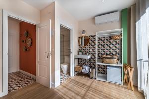Kuchyň nebo kuchyňský kout v ubytování Vestal Suites Domo