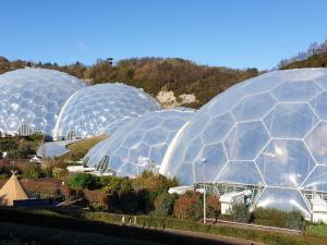 a group of domes of greenhouses in a field at Sea View in St Austell