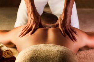 a man getting a back massage at a spa at Casa Tangalle ~ Peaceful, private villa in Tangalle