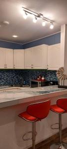 Кухня или мини-кухня в Amazing Beach View Apartments
