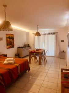 Ένα ή περισσότερα κρεβάτια σε δωμάτιο στο La carolina