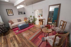 A bed or beds in a room at Inkarri Cusco