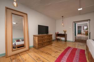 A television and/or entertainment centre at Inkarri Cusco