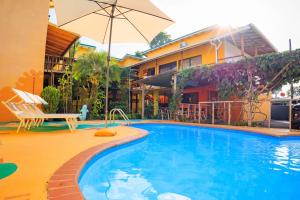 Bazén v ubytování Hotel Boutique La Casa de las Flores nebo v jeho okolí