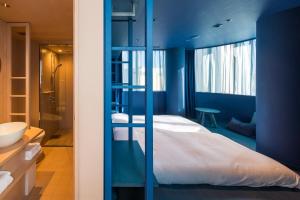 Postel nebo postele na pokoji v ubytování toggle hotel suidobashi TOKYO