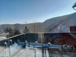 a view of a snow covered mountain from a building at Turkish Retreat in Saadet