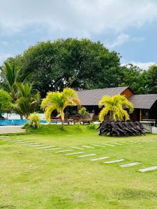 Vrt pred nastanitvijo Bay Beach Hotel